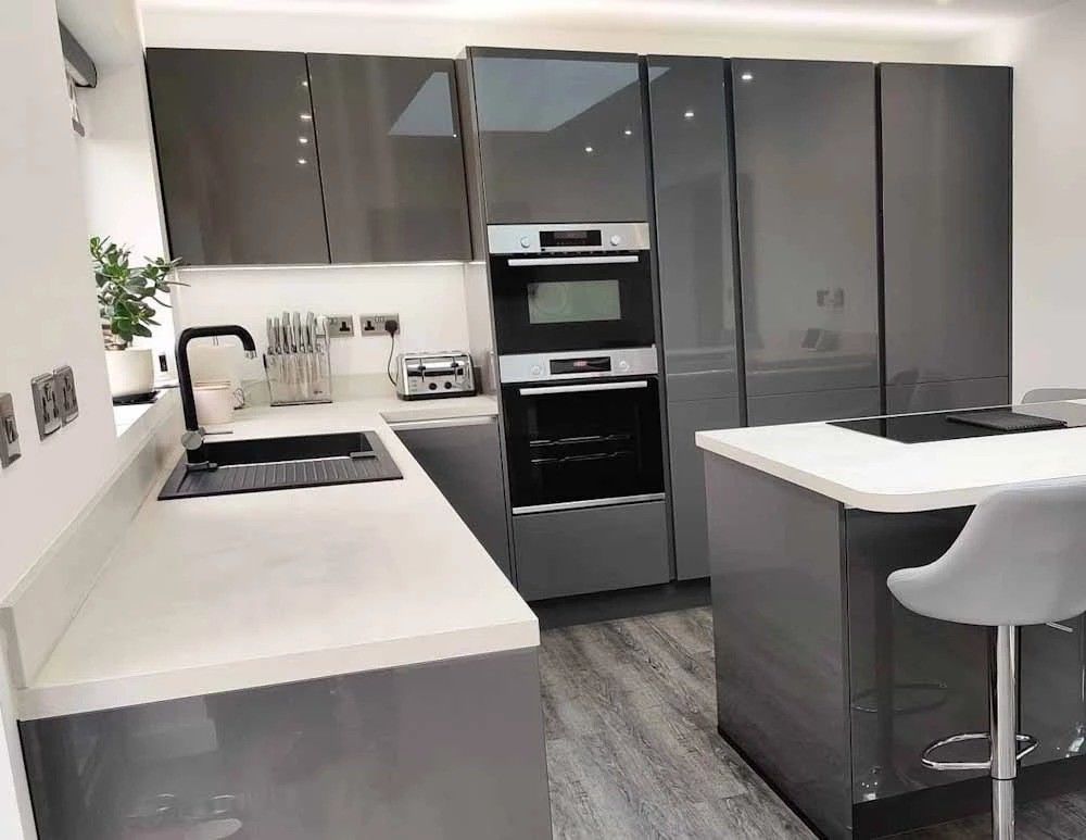 Convenient Lazy Susan Storage in Dark Pantry Unit Kitchen Cabinets with Blum Hardware